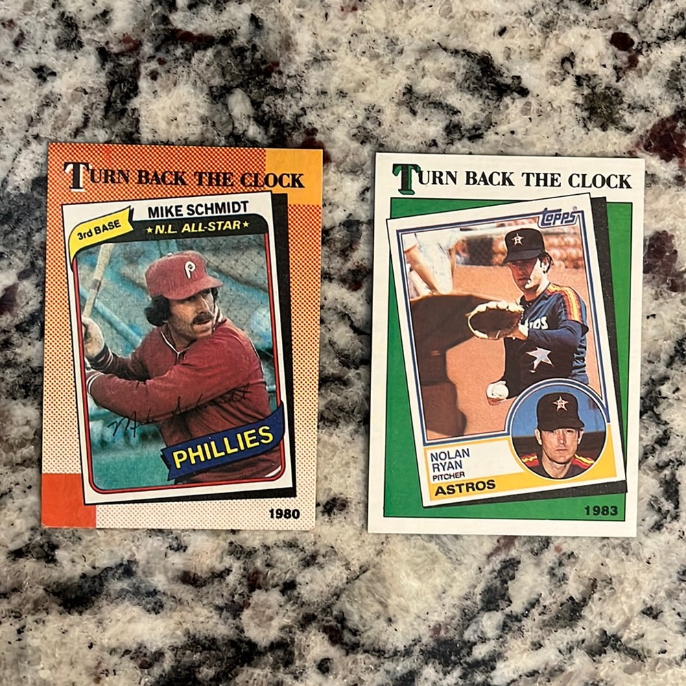 1988 Topps Nolan Ryan and 1990 Mike Schmidt Turn Back The Clock cards.